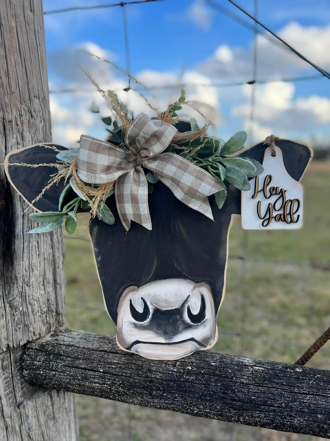 Cow Head wood sign