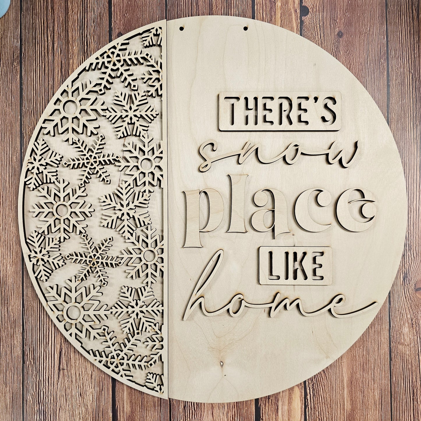 Snow Place Like Home round wood sign