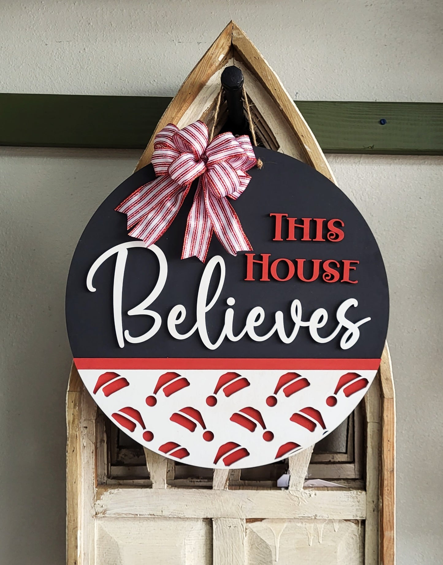 This House Believes round wood sign