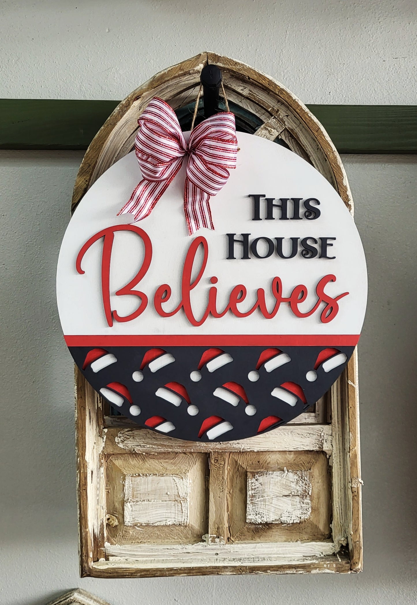 This House Believes round wood sign