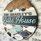 Welcome to The Lake House round wood sign